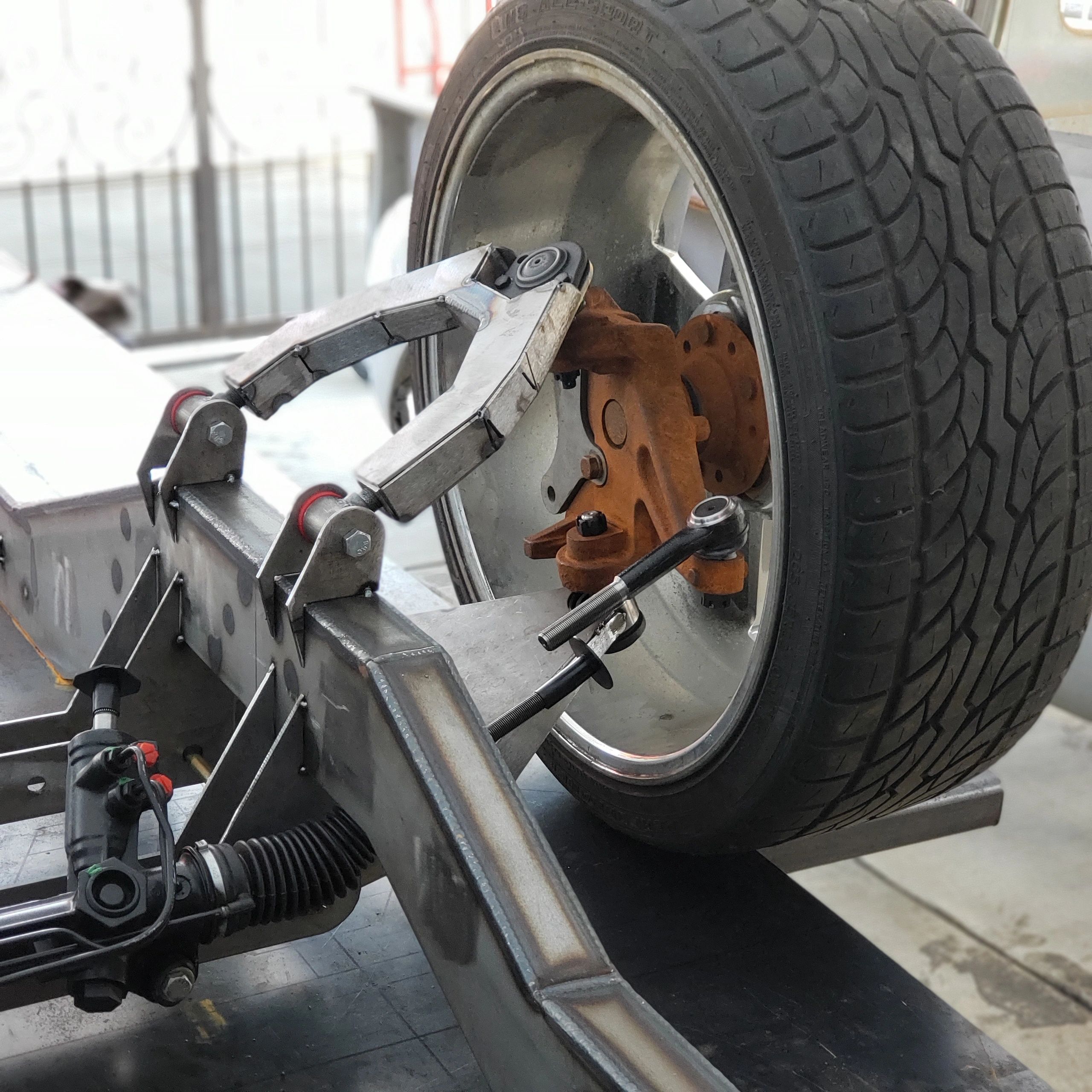 Custom fabricated control arms for Chevy truck by Ikon Industries